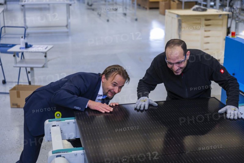Sunmaxx PVT is a new innovative developer of photovoltaic thermal solar modules. The Fraunhofer ISE has confirmed an overall efficiency of 80% for the PX-1 premium module. The innovation is the combination of photovoltaics and solar thermal energy in one element. Dr Jiri Springer Chief Technology Officer (CTO) and employee Emad Sidhorn at a PVT module, Ottendorf-Okrilla, Saxony, Germany, Europe