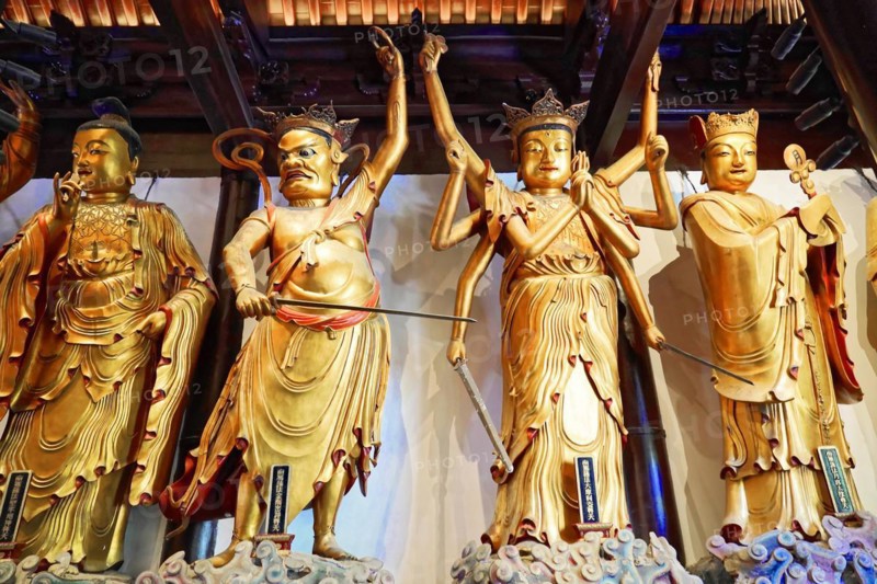 Jade Buddha Temple, Shanghai, Several large gold-coloured statues in an Asian temple, Shanghai, China, Asia