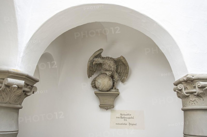 Restored original of the sculpture of the imperial eagle from 1721 from the town hall gable of the town of Wangen, mounted in the Hinderofenhaus, a 16th century official building on the market square of Wangen im Allgaeu, Upper Swabia, Baden-Wuerttemberg, Germany, Europe