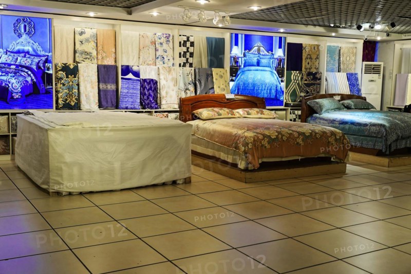 Silk Factory Shanghai, A bedroom exhibition with beds and colourful patterned bed linen, Shanghai, China, Asia