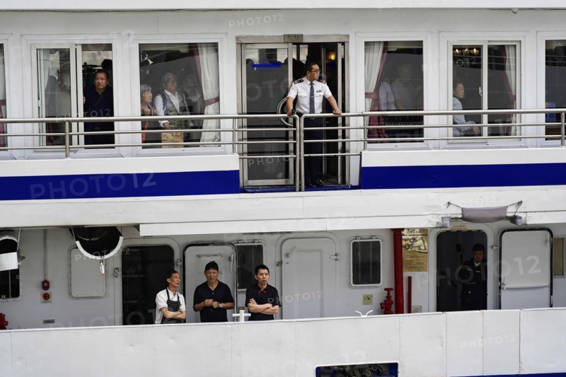 Chongqing, Chongqing Province, China, People standing at the railing of a ship, probably crew members in uniform, Chongqing, Chongqing, Chongqing Province, China, Asia