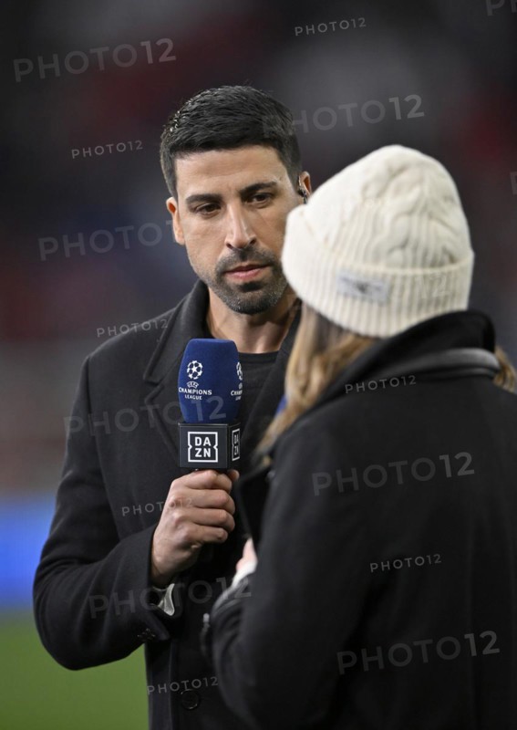 TV presenter Laura Wontorra DAZN, cap, interview with TV expert Sami Khedira, microphone, mike, logo, Allianz Arena, Munich, Bavaria, Germany, Europe