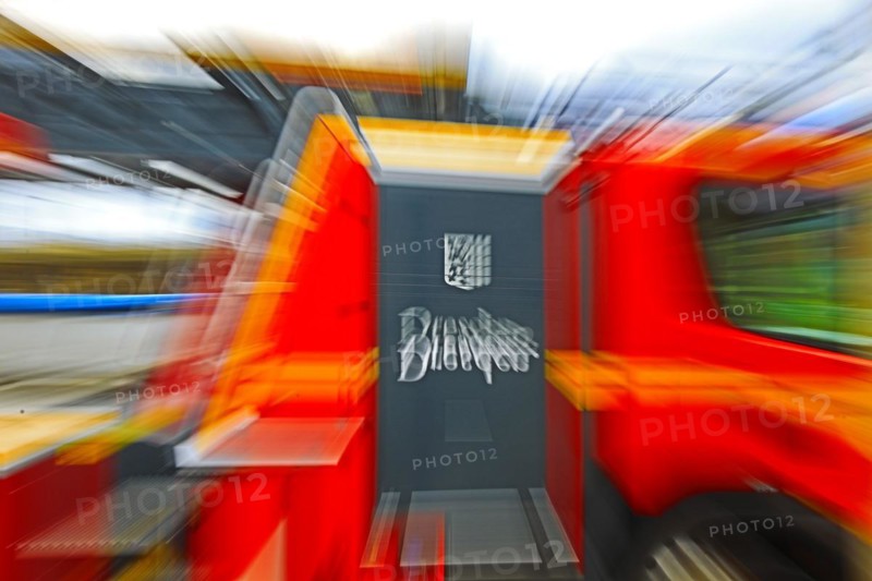 Highly blurred image of a fire engine in motion and action