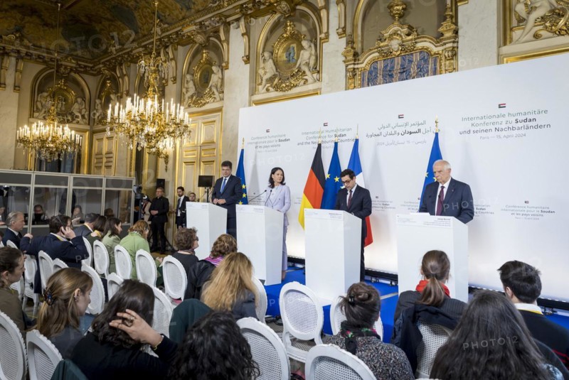 Annalena Baerbock (Alliance 90/The Greens), Federal Foreign Minister, takes a photo during her participation in the international humanitarian conference on Sudan and its neighbours. Here at a press conference with Stephane Sejourne (2nd from right), Foreign Minister of France, Josep Borrell (R), High Representative of the EU for Foreign Affairs and Security Policy, and Janez Lenarcic, EU Commissioner for Humanitarian Aid and Crisis Management. 'Photographed on behalf of the Federal Foreign Office'