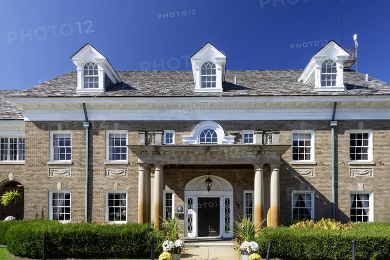 Saugatuck, Michigan, The Felt Mansion. Built as a summer home for Dorr and Agnes Felt in the 1920s, the 12, 000 square foot house has 25 rooms and a ballroom on three floors. The restored building is now used for special events. Felt became a millionnaire after inventing the Comptometer, which performed basic math functions