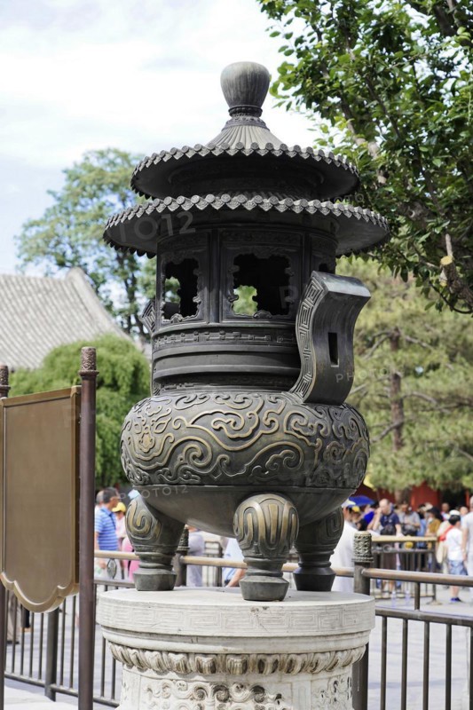 New Summer Palace, Beijing, China, Asia, An ornately engraved cauldron detail in the exterior of a cultural site, Beijing, Asia