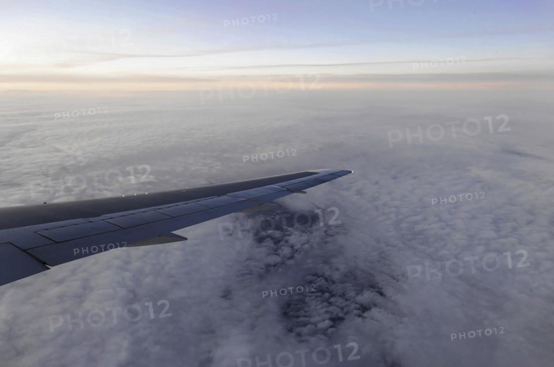 Flight to Stuttgart, Germany, Early morning view through aeroplane window of wings and cloud cover, AUGUSTO C. SANDINO Airport, Managua, Nicaragua, Central America, Central America