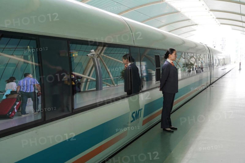 Shanghai Transrapid Maglev Shanghai Maglev Train Station Station, Shanghai, China, Asia, People boarding a train on a modern platform in the city centre, Asia