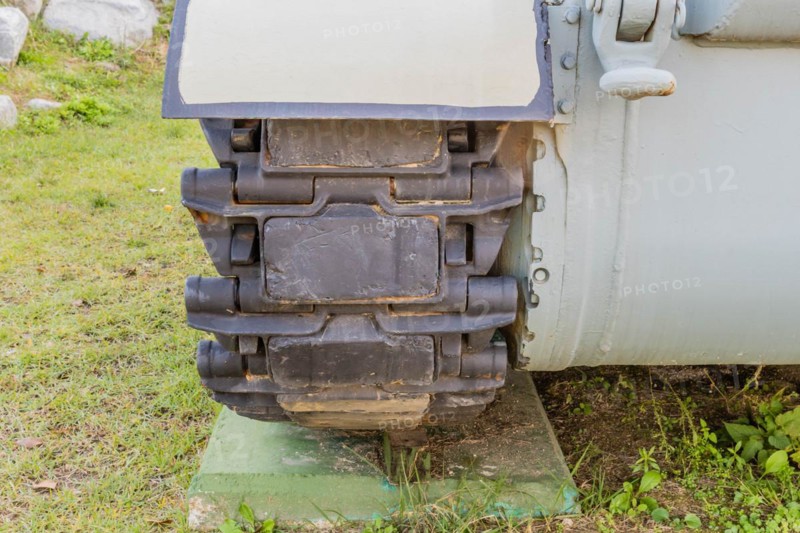 Closeup of metal tracks on military tank at public military history park in Nonsan, South Korea, Asia