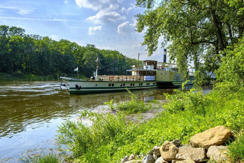 The historic paddle steamer KURORT RATHEN has docked at the steamer landing stage in Pillnitz, Dresden, Saxony, Germany, Europe