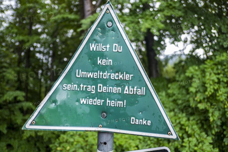 Keeping the environment clean, message to polluters and cyclists on a sign at the upper entrance to the Eistobel, in the nature reserve of the same name near Gruenenbach in Westallgaeu, Bavaria, Germany, Europe