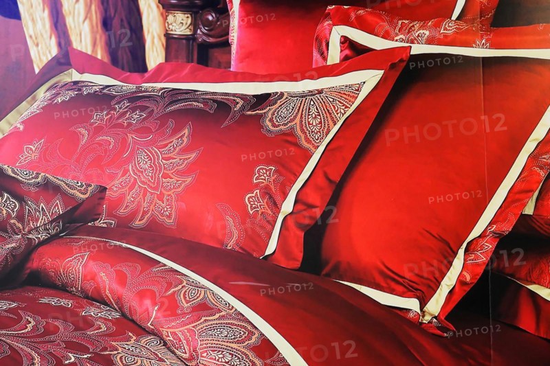 Silk factory Shanghai, Red satin cushions with golden embroidery on a bed in detail, Shanghai, China, Asia