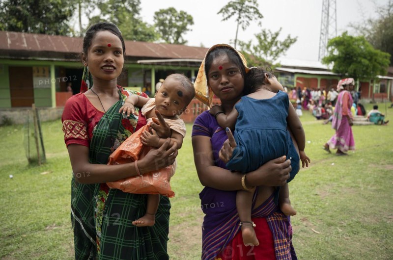 BOKAKHAT, INDIA, APRIL 19: Women with child show their marked finger after casting their votes during the first phase of the India's general elections on April 19, 2024 in Bokakhat, Assam, India. Nearly a billion Indians vote to elect a new government in six-week-long parliamentary polls starting today