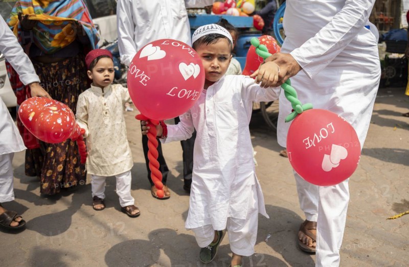 GUWAHATI, INDIA, APRIL 11: Muslim people with children walk towards an Eidgah to perform Eid Al-Fitr prayer in Guwahati, India on April 11, 2024. Muslims around the world are celebrating the Eid al-Fitr holiday, which marks the end of the fasting month of Ramadan