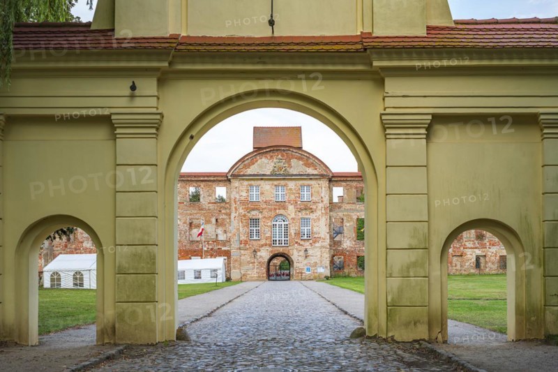 Yellow Gate, Dargun Castle and Monastery, in its present form dating back to the late 17th century, in the eponymous town of Dargun, Mecklenburg Lake District, Mecklenburg-Western Pomerania, Germany, state 5 August 2019, Europe