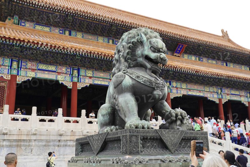 China, Beijing, Forbidden City, UNESCO World Heritage Site, A traditional stone sculpture of a lion in front of the Imperial Palace, Asia