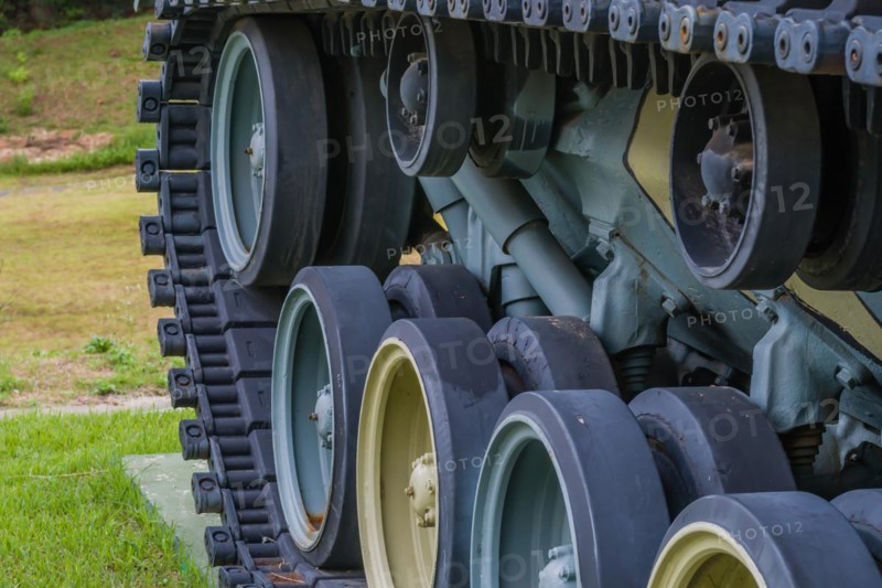 Closeup of wheels and track of military tank on display in public park in Nonsan, South Korea, Asia