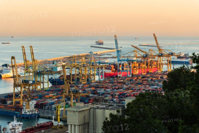 Container harbour in evening light in Barcelona, Spain, Europe