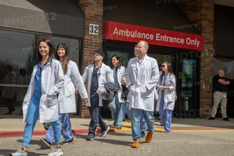Detroit, Michigan USA, 18 April 2024, Doctors walk out of the emergency room at Ascension St. John Hospital to begin a one-day strike to protest understaffing and unsafe conditions. The emergency room is operated by Team Health, which is owned by the private equity firm Blackstone. The 43 emergency doctors, physician assistants, and nurse practitioners organized the Greater Deroit Association of Emergency Physicians nearly a year ago