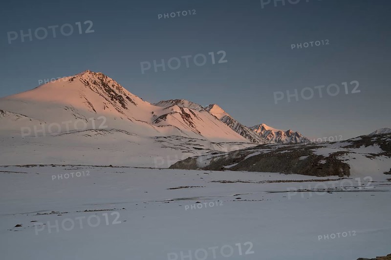 Sunrise at the snowy Cold Peak, 3373m, Tavan Bogd National Park, Mongolian Altai Mountains, Western Mongolia, Mongoleii