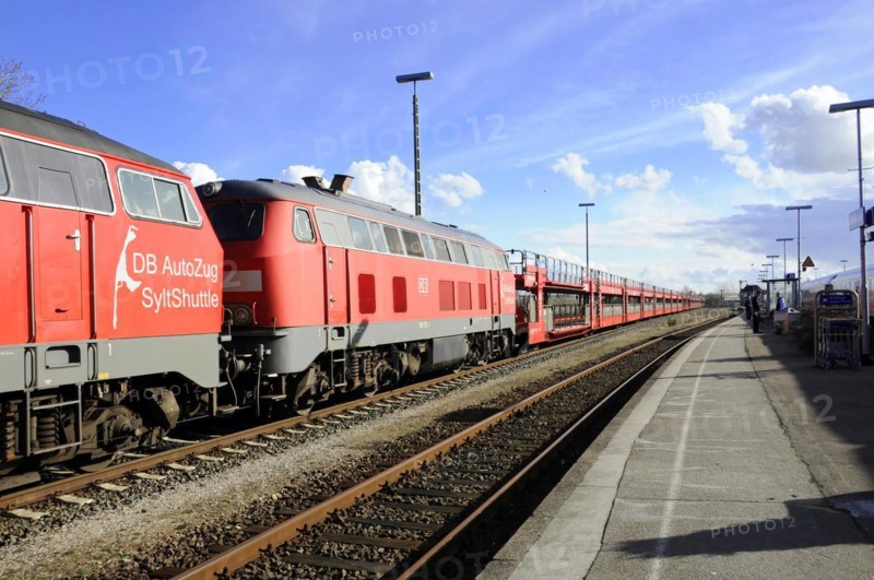 Red DB AutoZug Sylt Shuttle standing on tracks in sunny weather, Sylt, North Frisian Island, Schleswig-Holstein, Germany, Europe