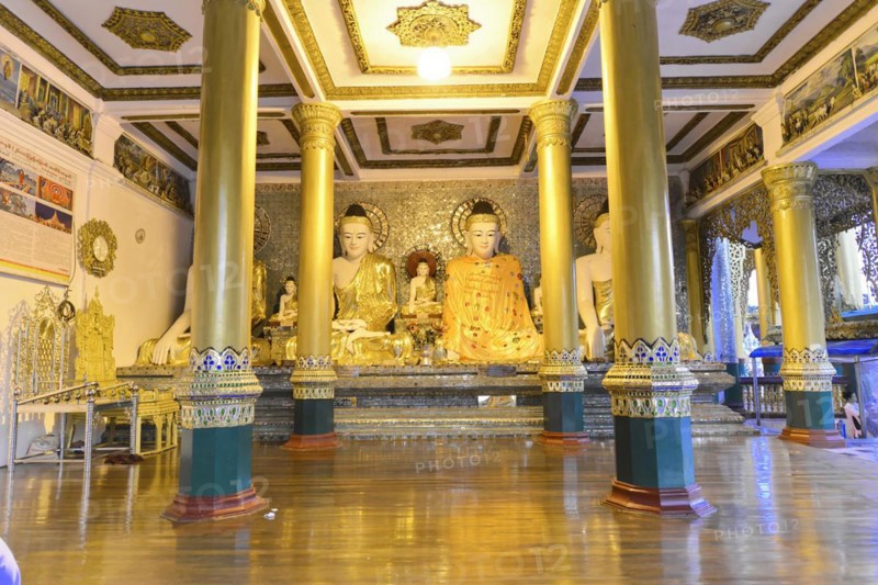 Shwedagon Pagoda, Yangon, Myanmar, Asia, Golden Buddha statues in a richly decorated interior of a temple in Myanmar, Asia
