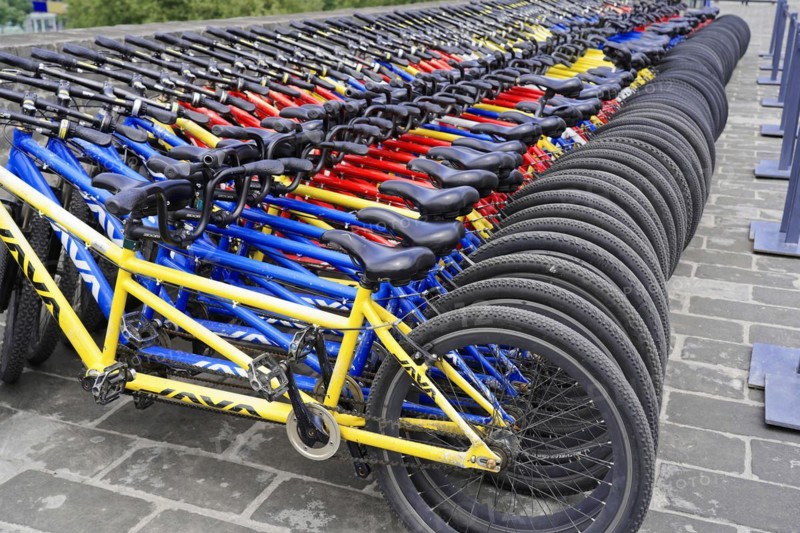Rental bicycles, Xian, Shaanxi, China, AsiaArranged rows of bicycles in different colours for public use, Xian, Shaanxi Province, China, Asia