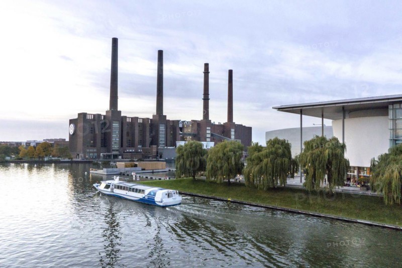 A ship passes the VW plant in Wolfsburg on the Mittelland Canal, 25 October 2015, Wolfsburg, Lower Saxony, Germany, Europe