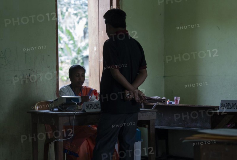 BOKAKHAT, INDIA, APRIL 19: Voters at a polling station to cast their votes during the first phase of the India's general elections on April 19, 2024 in Bokakhat, Assam, India. Nearly a billion Indians vote to elect a new government in six-week-long parliamentary polls starting today