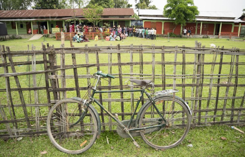 BOKAKHAT, INDIA, APRIL 19: Voters wait in line at a polling station to cast their votes during the first phase of the India's general elections on April 19, 2024 in Bokakhat, Assam, India. Nearly a billion Indians vote to elect a new government in six-week-long parliamentary polls starting today