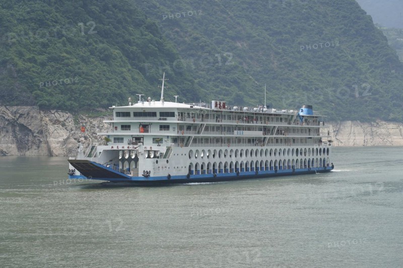 Chongqing, Chongqing Province, Cruise ship on the Yangtze River, Large cruise ship sailing on a river in front of picturesque green hills, Yichang, Hubei Province, China, Asia