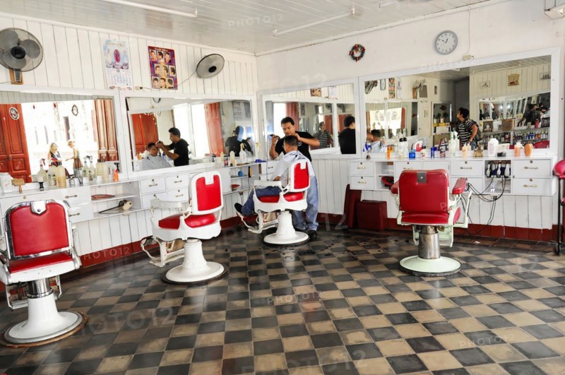 Granada, Nicaragua, Interior view of a traditional hairdressing salon with red and white barber chairs and chequered floor, Central America, Central America -, Central America
