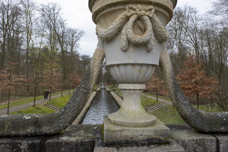 View from a stone bridge with an ornamental vase onto a canal in the castle park, Ludwigslust, Mecklenburg-Vorpommern, Germany, Europe