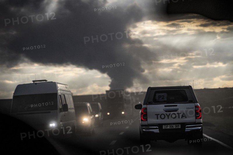 The Federal Minister for Economic Affairs and Climate Protection Robert Habeck (Alliance 90/The Greens) is visiting Poland, Ukraine and the Republic of Moldova from 17.04-19.04.2024. Odessa, 19.04.2024. Drive past the column of smoke in the port of Odessa, where there was a missile strike in the morning