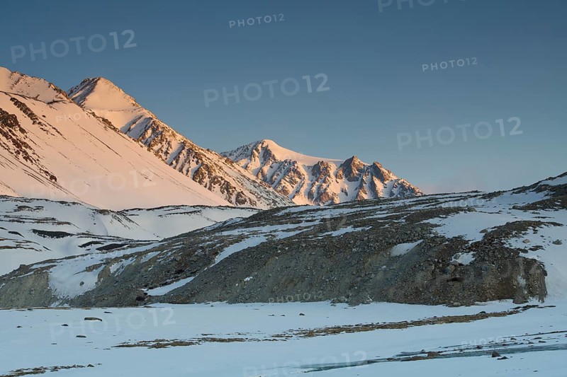 Sunrise at the snowy Cold Peak, Mongolian Chueiten, 3373m, Tavan Bogd National Park, Mongolian Altai Mountains, Western Mongolia, Mongolia, Asia