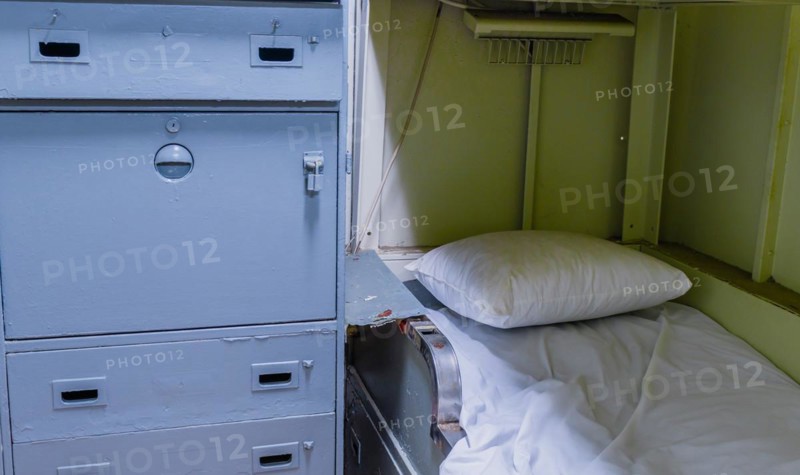 Bunk bed and cabinet in sailor's cabin on board battleship at Unification Park in Gangneung, South Korea, Asia