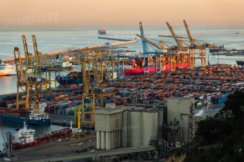 Container harbour in evening light in Barcelona, Spain, Europe