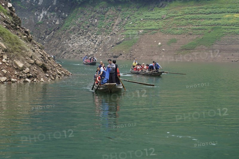 Special boats for the side arms of the Yangtze, for the tourists of the river cruise ships, Yichang, China, Asia, passengers in a boat enjoy a peaceful ride on a quiet river, Hubei Province, Asia