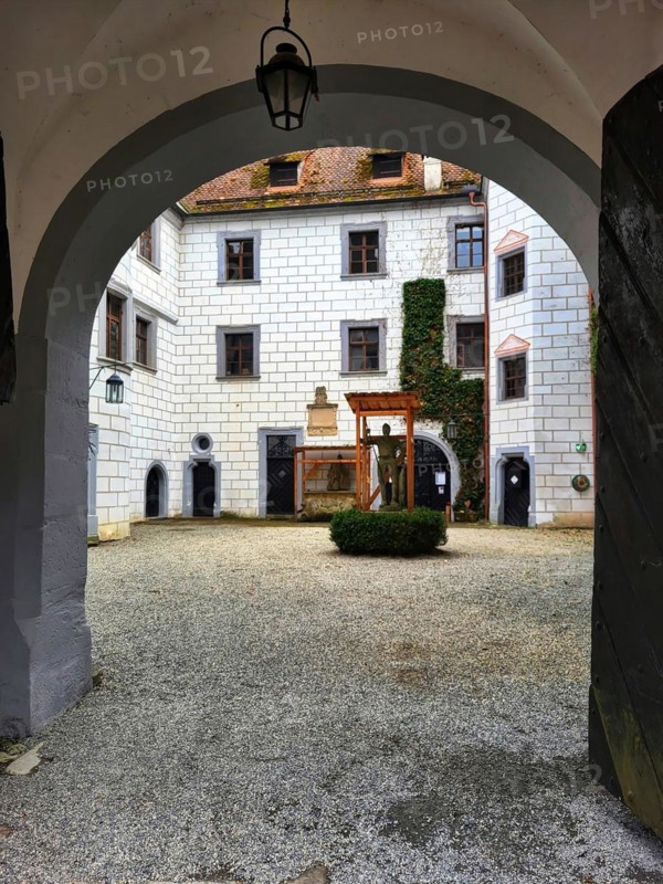 Mitwitz moated castle under a cloudy sky. Mitwitz, Kronach, Upper Franconia, Bavaria, Germany, Europe