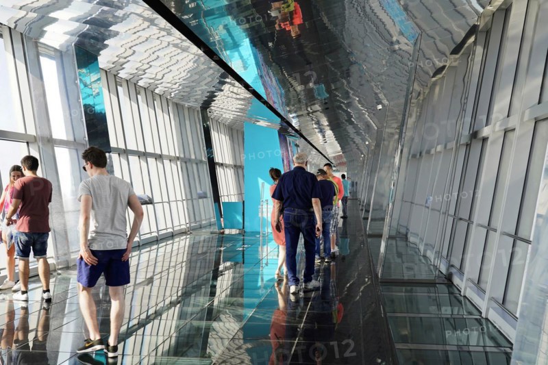 Observation deck, The Bottle Opener at 492 metres, visitors experience a unique perspective on a reflective glass floor of an observation deck, Shanghai, China, Asia