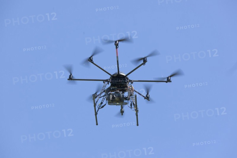 Drone with eight propellers, octocopter, in flight with camera for film and photo shoots, 07.06.2015, Thale, Saxony-Anhalt, Germany, Europe