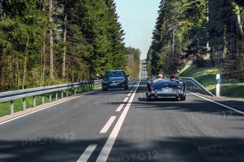 Country road near Boerwang with an old MG sports car, Allgaeu, Swabia, Bavaria, Germany, Europe