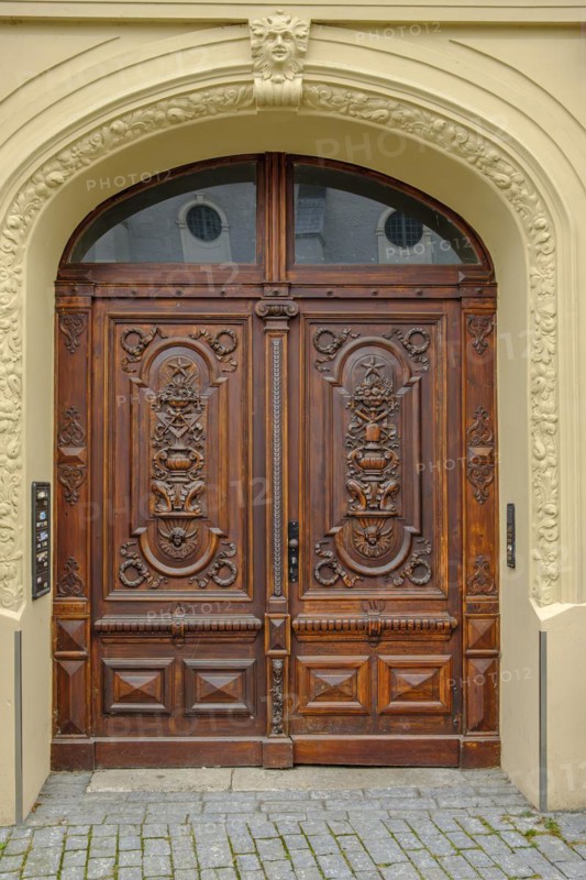 Richly decorated historic front door from 1902 at Herderplatz No. 3 in the old town centre of Weimar, Thuringia, Germany, Europe