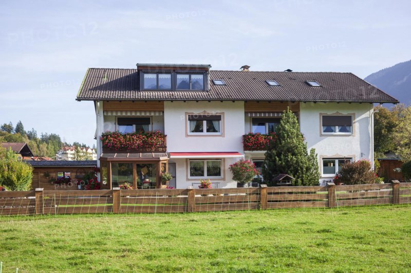 Residential house with holiday flats and pasture, district of Garmisch, Garmisch-Partenkirchen, Werdenfelser Land, Upper Bavaria, Bavaria, Germany, Europe