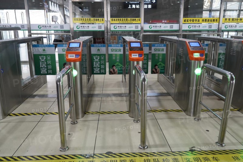 Hongqiao railway station, Shanghai, China, Asia, Access area with turnstiles and ticket readers in a railway station, Yichang, Hubei province, Asia
