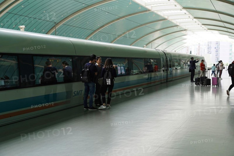 Shanghai Transrapid Maglev Shanghai Maglev Train Station Station, Shanghai, China, Asia, Passengers waiting next to a train on a modern platform with glass walls, Asia