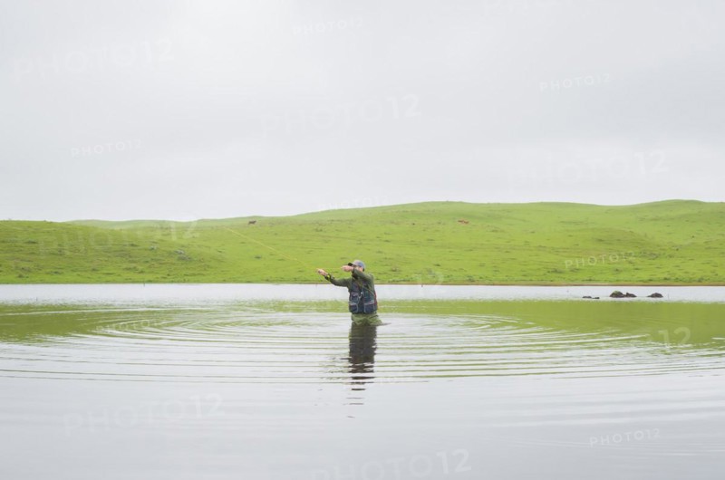 Black bass fisherman fishing with flyfishing, Cambara do sul, Rio Grande do sul, Brazil, South America