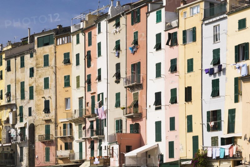 Colourful apartment building facades with clothes hung out to dry, Portovenere, La Spezia province, Italy, Europe