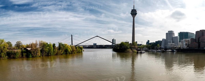 View from the harbour bridge at the media harbour to Rheinkniebruecke, Rheinturm and Frank-Gehry-Bauten, Duesseldorf, North Rhine-Westphalia, Germany, Europe, Panorama, Europe