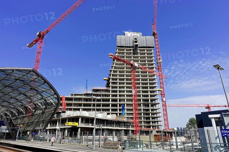 Elbtower, unfinished skyscraper in the east of Hamburg's Hafencity, designed by David Chipperfield, SIGNA HOLDING, Lively construction site with skyscraper, cranes and visible platforms on a sunny day, Hamburg-Hafencity, Hamburg, Hanseatic City of Hamburg, Germany, Europe